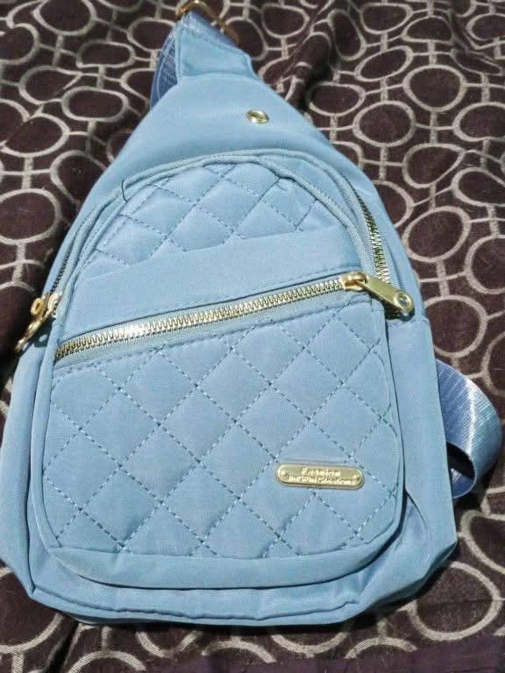 Quilted Light Blue Crossbody Sling Bag with Gold Accents
